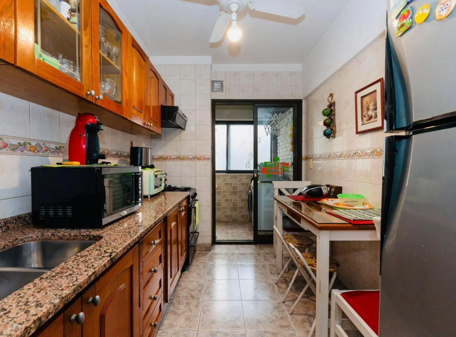VENTA DEPTO 2 AMBIENTES Cid Campeador con cochera 4