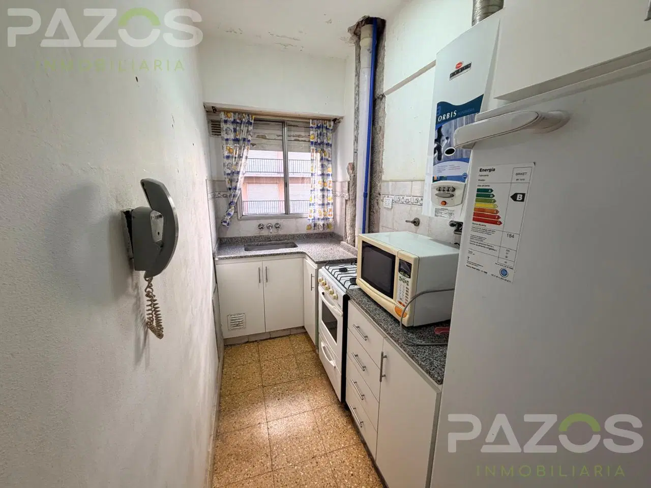 Departamento de una ambiente dividido con balcon a la calle 1