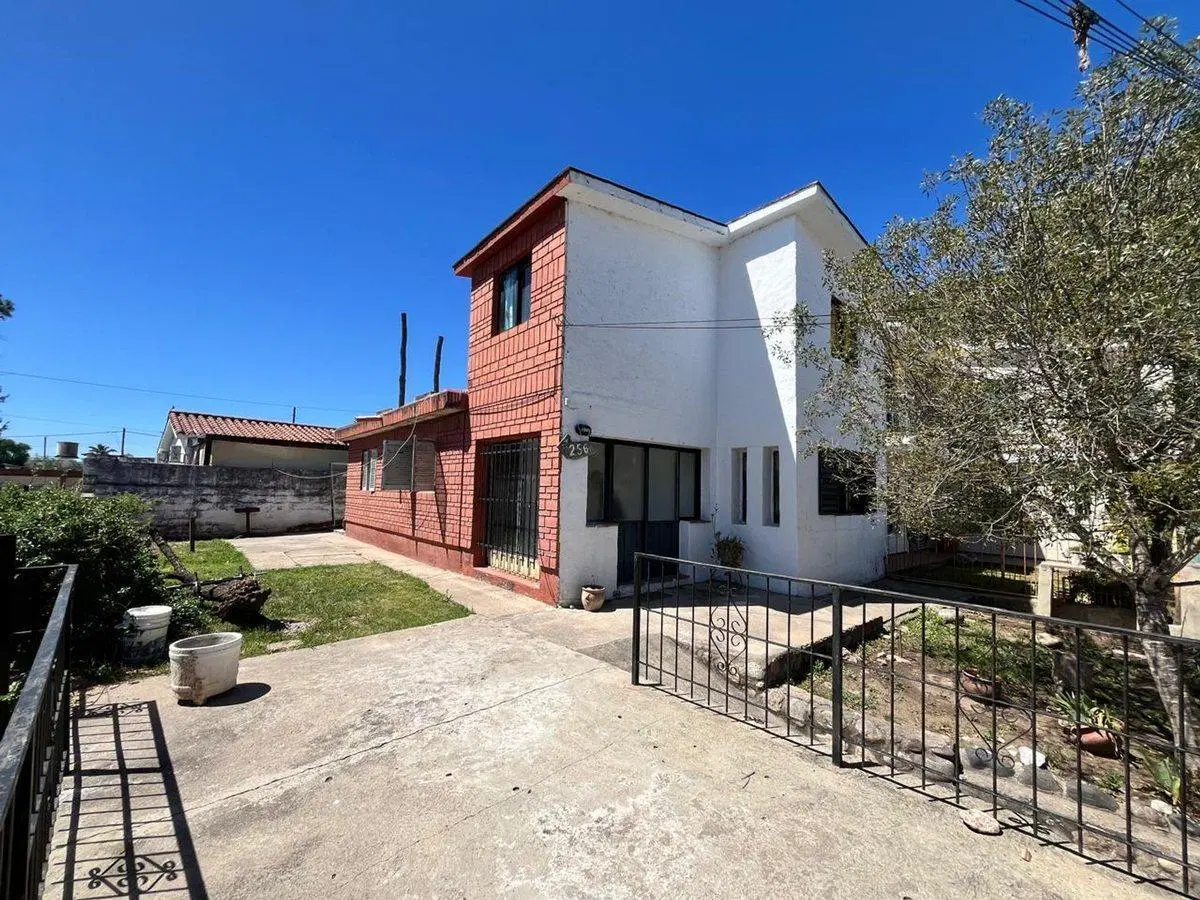 VENTA CASA 3 DORM MAS DEPTO VILLA CARLOS PAZ 4