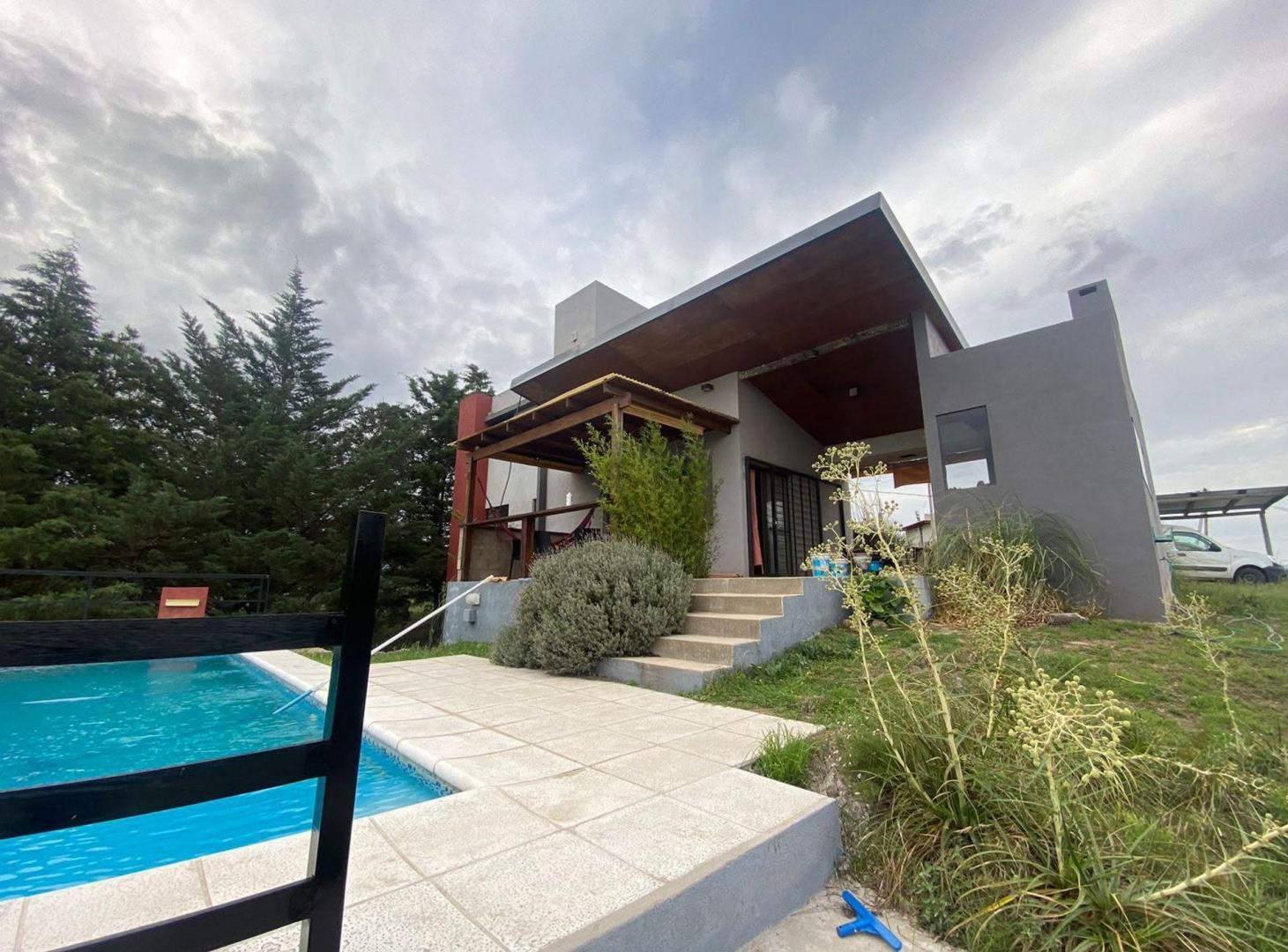 Foto de VENTA CASA 2 DORMITORIOS PILETA POTRERO GARAY CBA, imagen 1