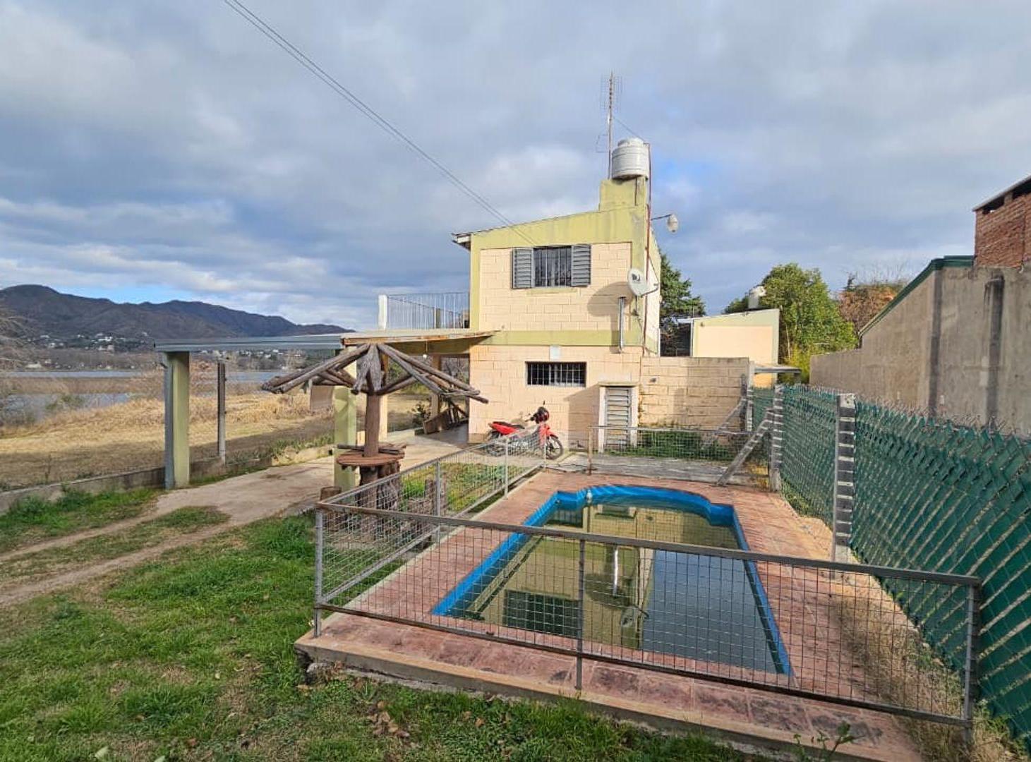 Foto de VENTA 2 DUPLEX CON PILETA FRENTE AL LAGO BIALET M., imagen 1