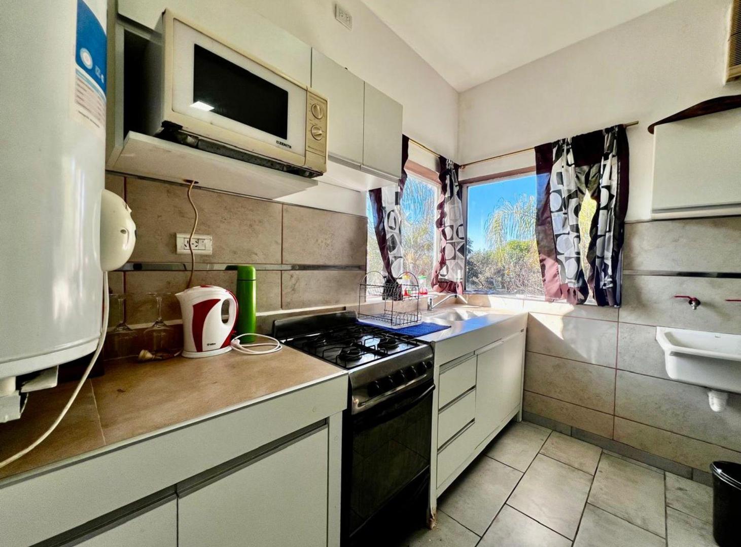 Foto de VENTA DOS DUPLEX CON PILETA VILLA LA BOLSA, imagen 2