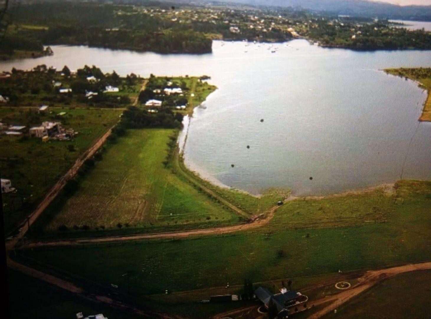 Foto de Venta Lote 4.180M costa al lago Potrero de Garay, imagen 1
