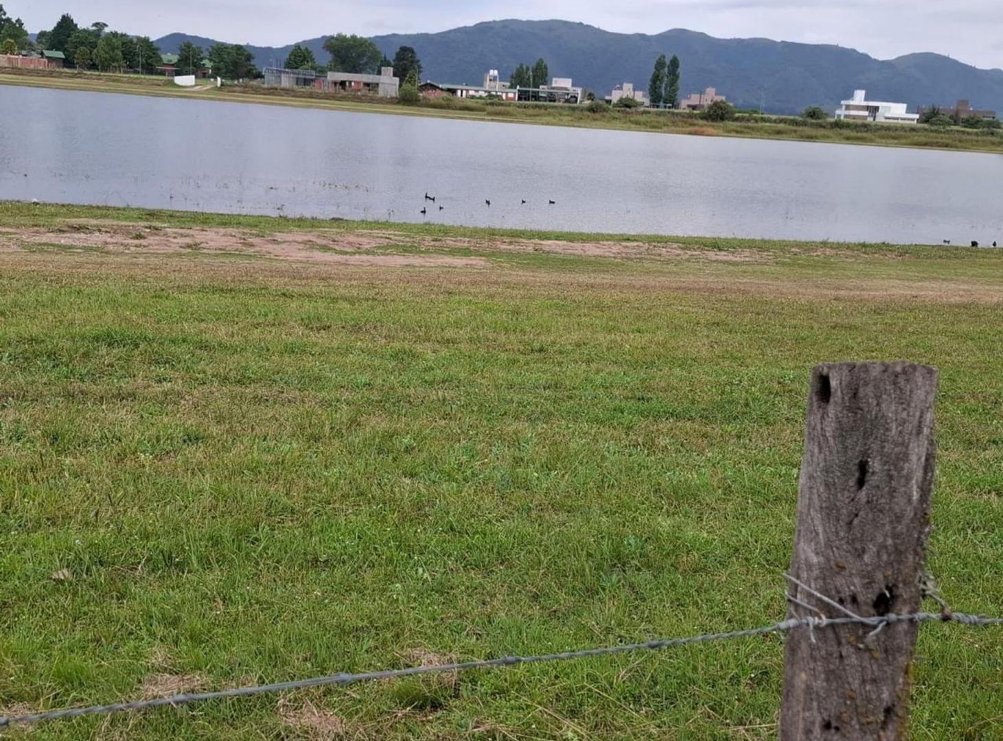 Foto de Venta Lote 4.180M costa al lago Potrero de Garay, imagen 4