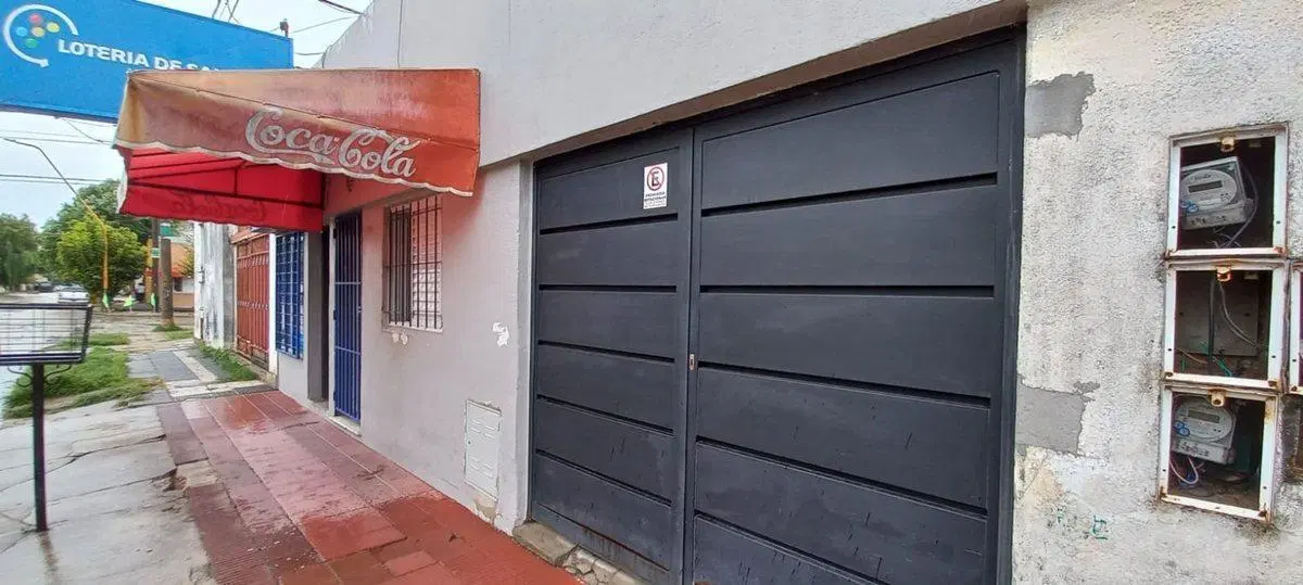 Propiedad q/consta de 4 Casas y un local comercial 2