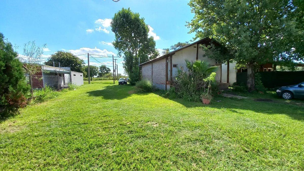 Foto de CASA Y TERRENO SOBRE RUTA 11 N° 8125 - SAUCE VIEJO, imagen 2