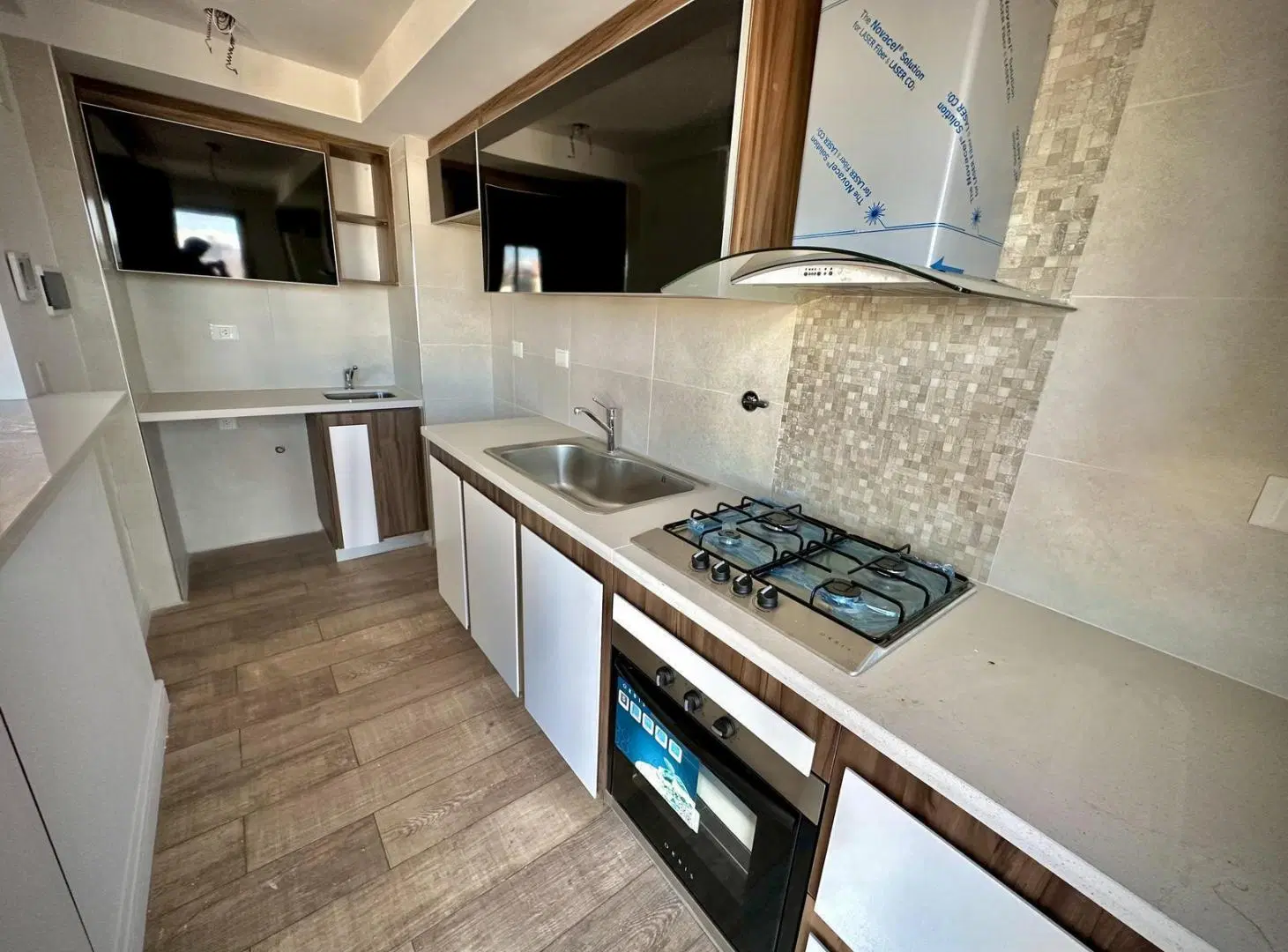 VENTA SEMIPISO 2 AMBIENTES A ESTRENAR C/ COCHERA PLAZA MITRE 2