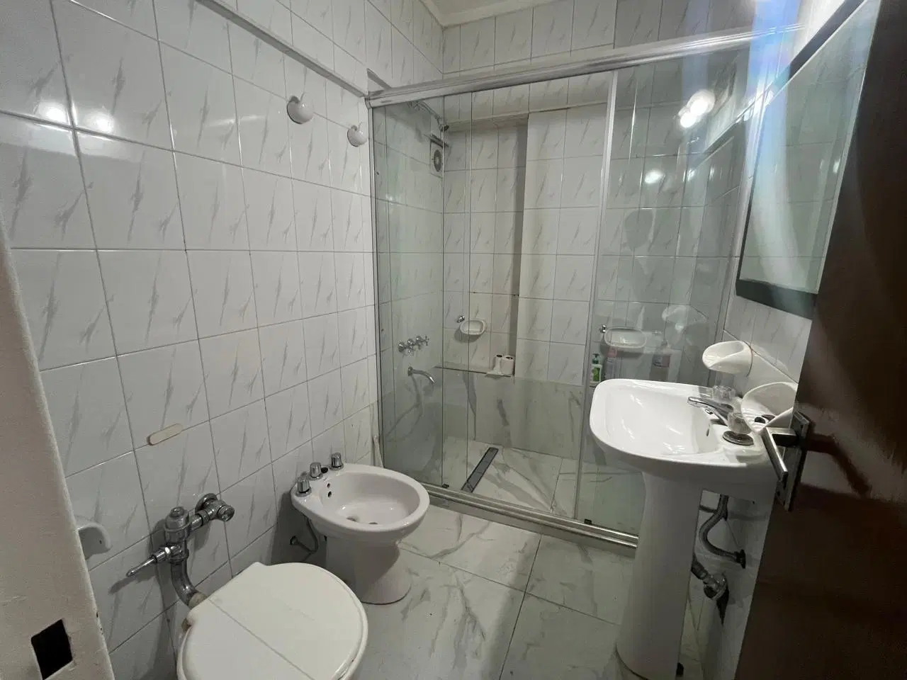 Departamento 4 ambientes con balcon y patio con parrila, piso alto en Caballito 3