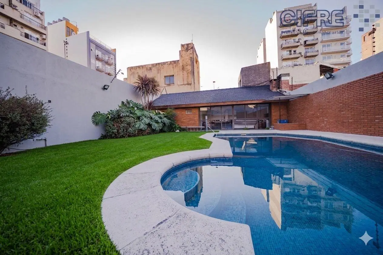 Casa lote 13x45 de todo en PB 5 ambientes jardín, pileta, quincho y cocheras  en Villa Pueyrredon 4