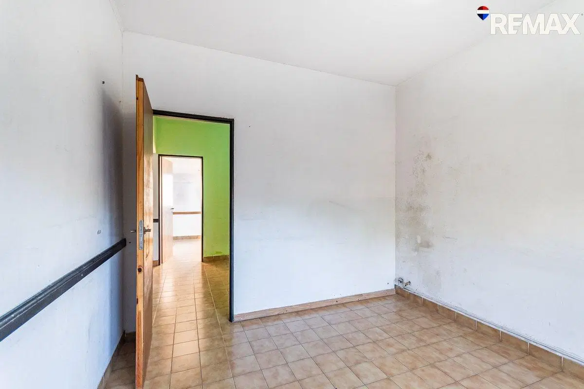 VIVIENDA MULTIFAMILIAR CIUD. EVITA 3 DEPARTAMENTOS 2