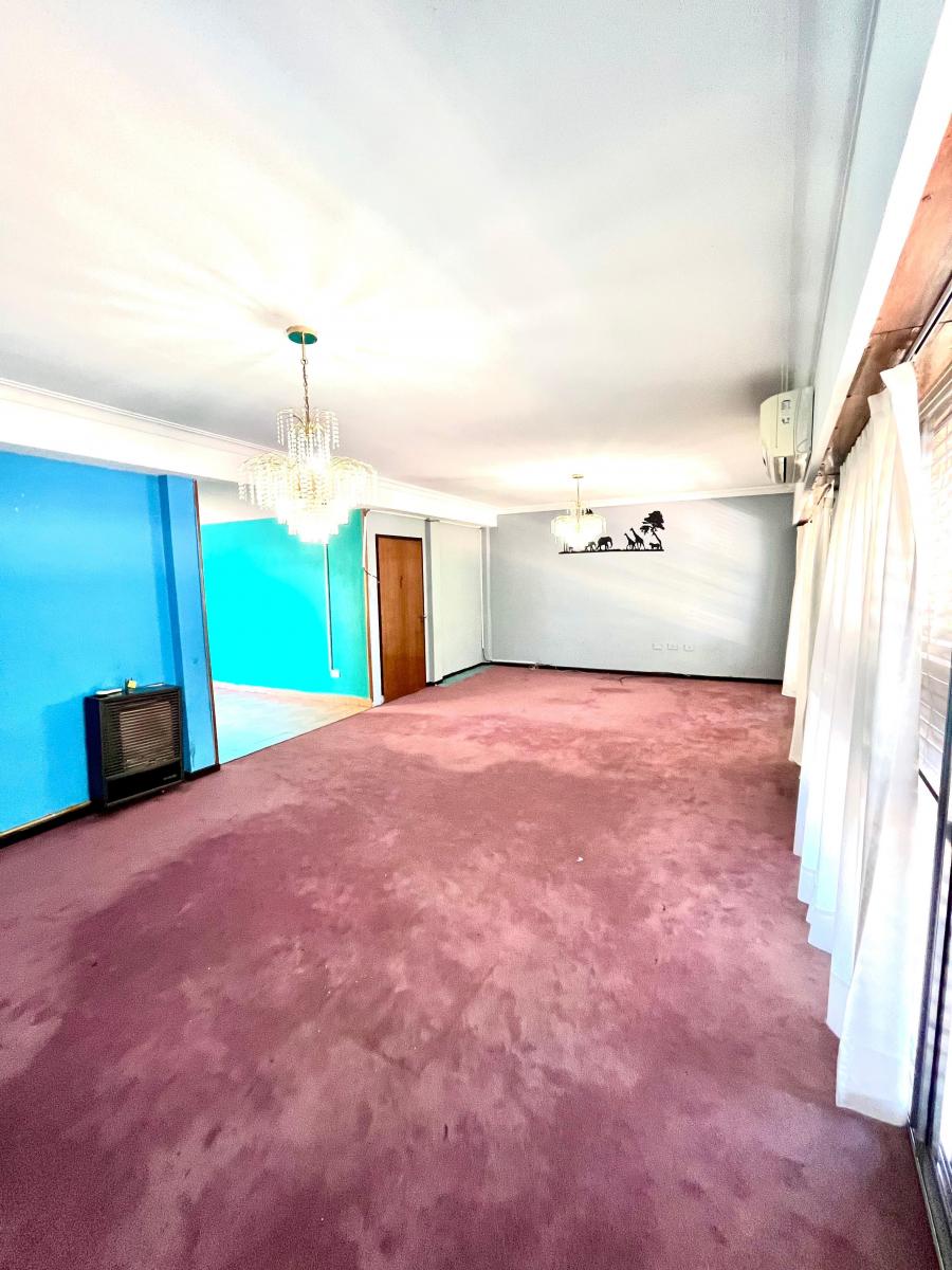 Piso de 4 Ambientes, Sin Expensas, con Terraza y Lavadero 2