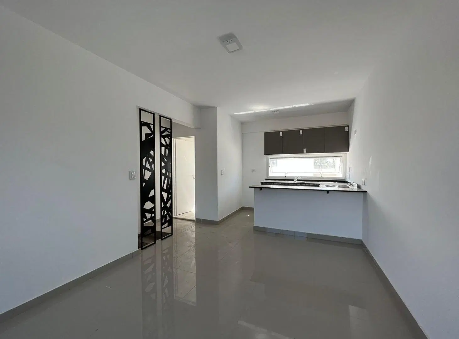 Departamento duplex tres ambientes con cochera en venta en Wilde 4