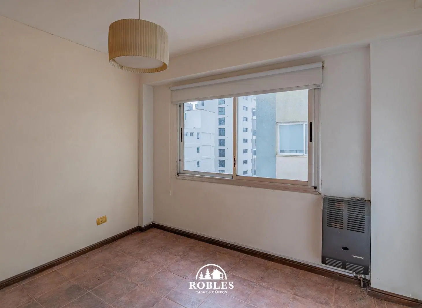 Departamento dos ambientes en el entorno de La Perla 1