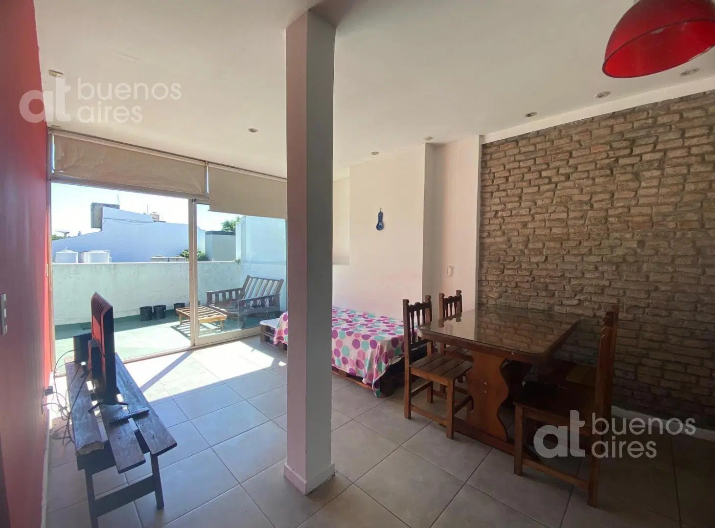 Departamento dos ambientes con balcón y terraza con Parrila 4