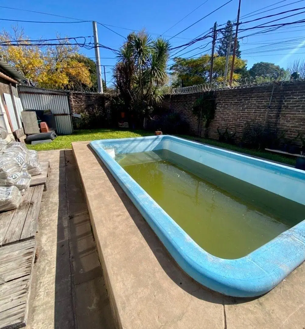Casa sobre Lote propio de 10 x 20 Jardín y pileta 5