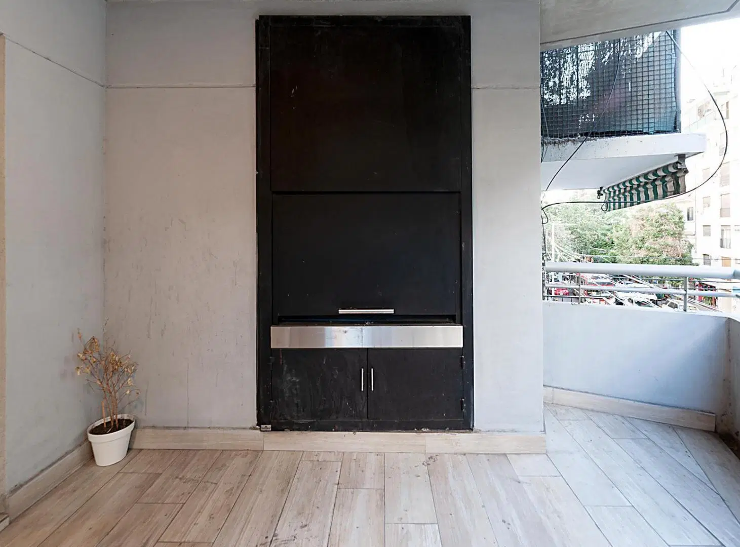 Venta Departamento 4 ambientes Belgrano con cochera y balcón aterrazado con parrilla. 5