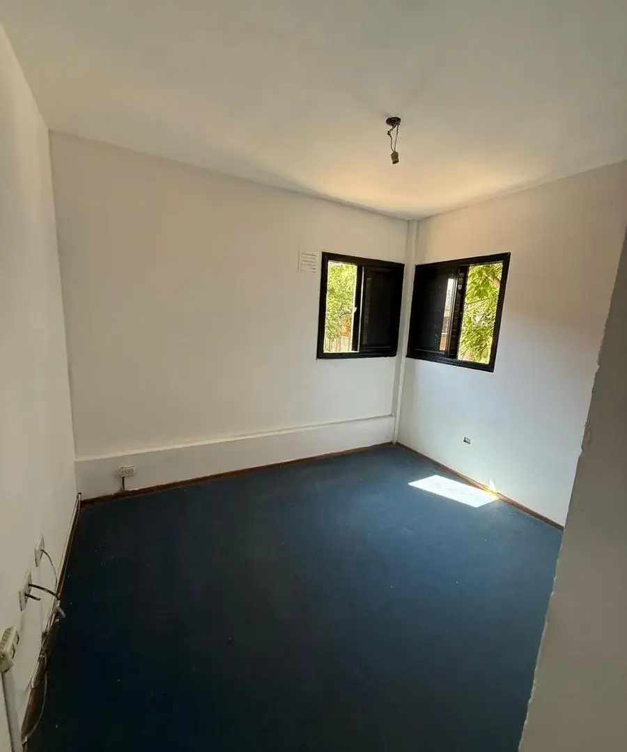 San Lorenzo 3800. Un dormitorio de Escalera 3