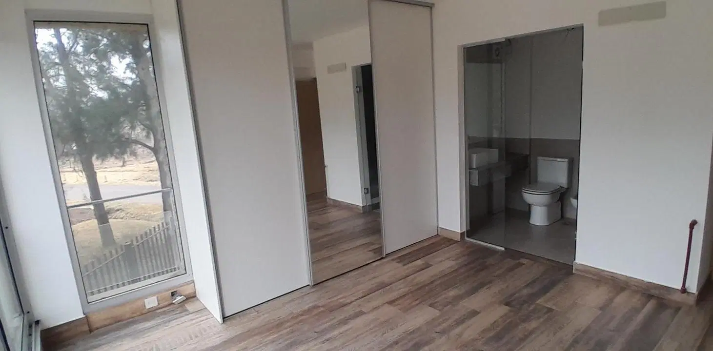 DEPARTAMENTO PREMIUM DE 2 DORMITORIOS VENTA PILETA QUINCHO ALDEA ROSARIO 5