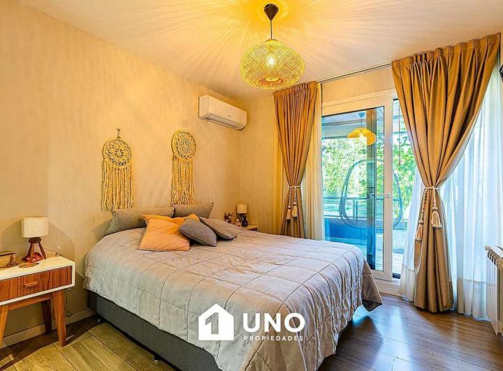 Departamento de 2 dormitorios con patio exclusivo y amenities en Condos Refinería 5