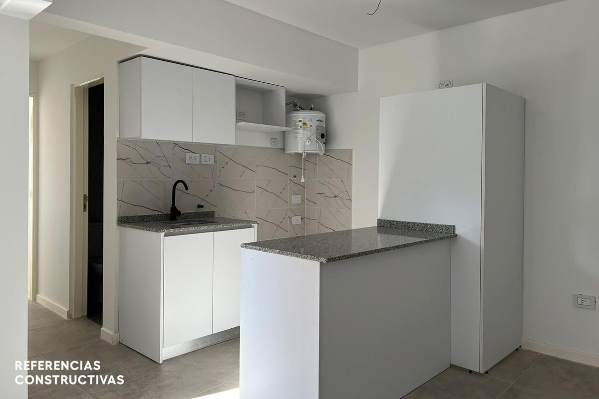Foto de Departamento de 1 dormitorio con amplio estar y balcón en barrio, imagen 1