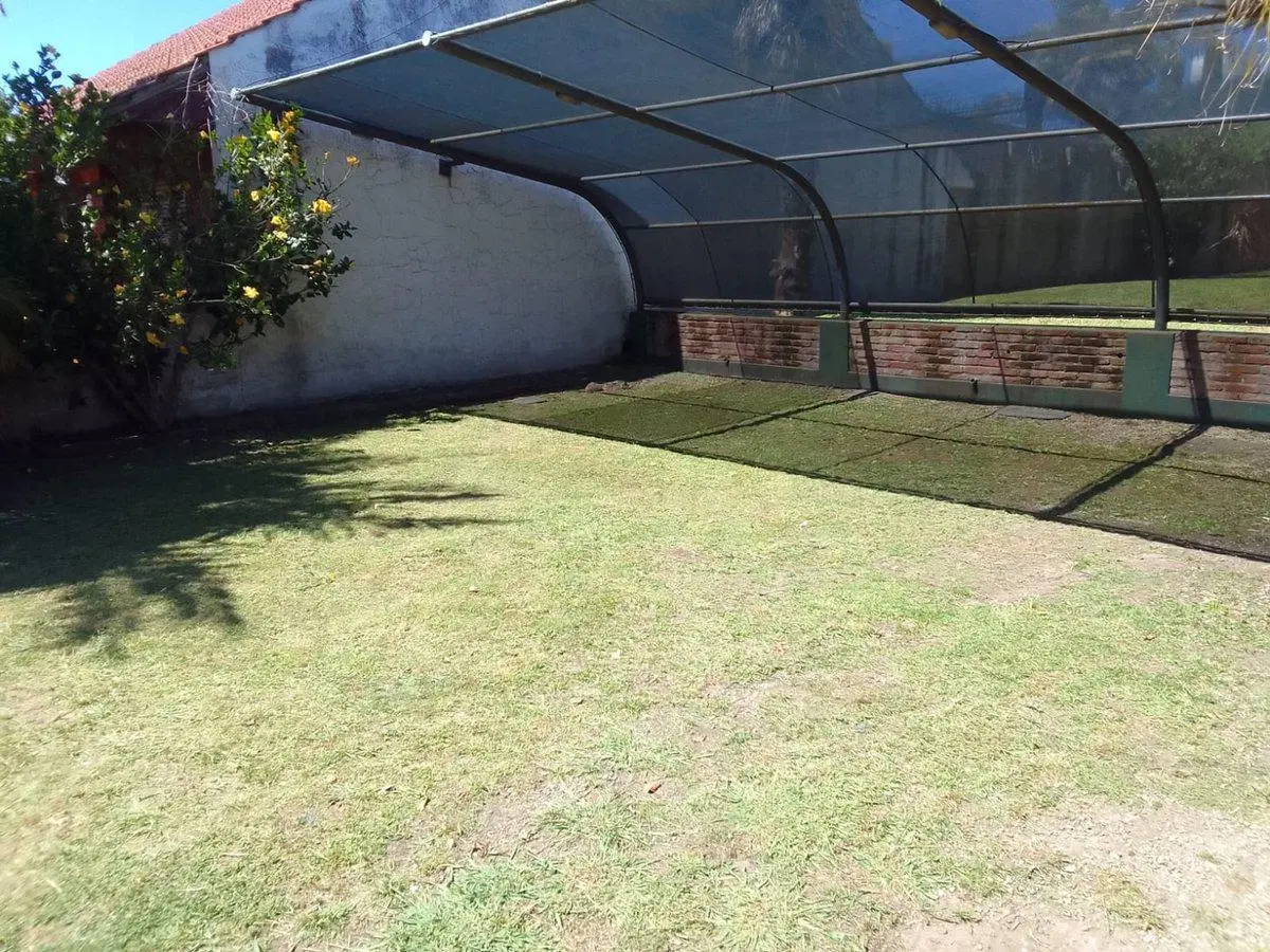 VENTA LOTE 450 M2 CON MEJORAS EN PUNTA MOGOTES 2
