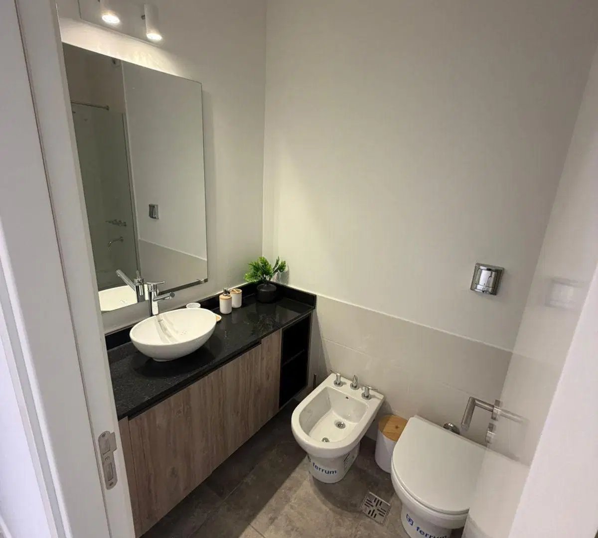 VENTA DEPARTAMENTO 2 DORMITORIOS , A ESTRENAR , CON PATIO Y COCHERA PROPIA 5