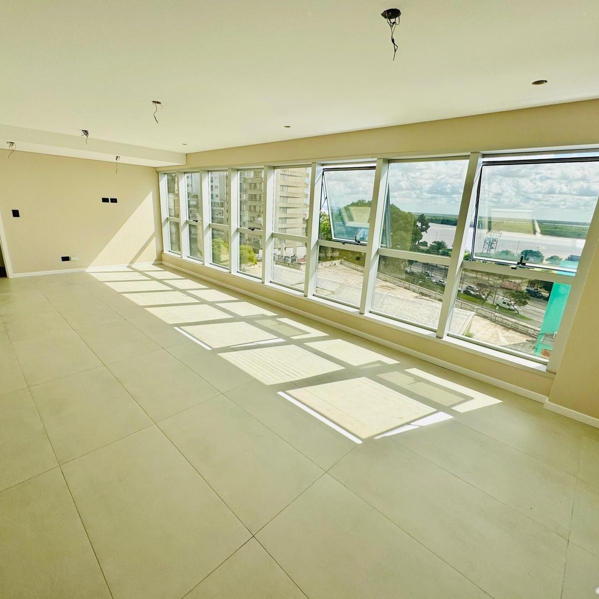 PISO EXCLUSIVO VISTA RIO, TRES DORMITORIOS Y DOS COCHERAS