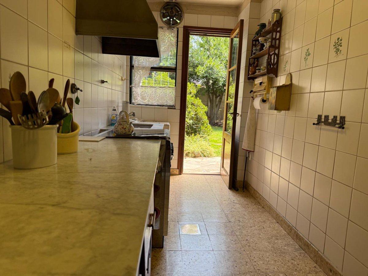 Foto de Casa de una planta con altillo y jardín Martinez, imagen 3