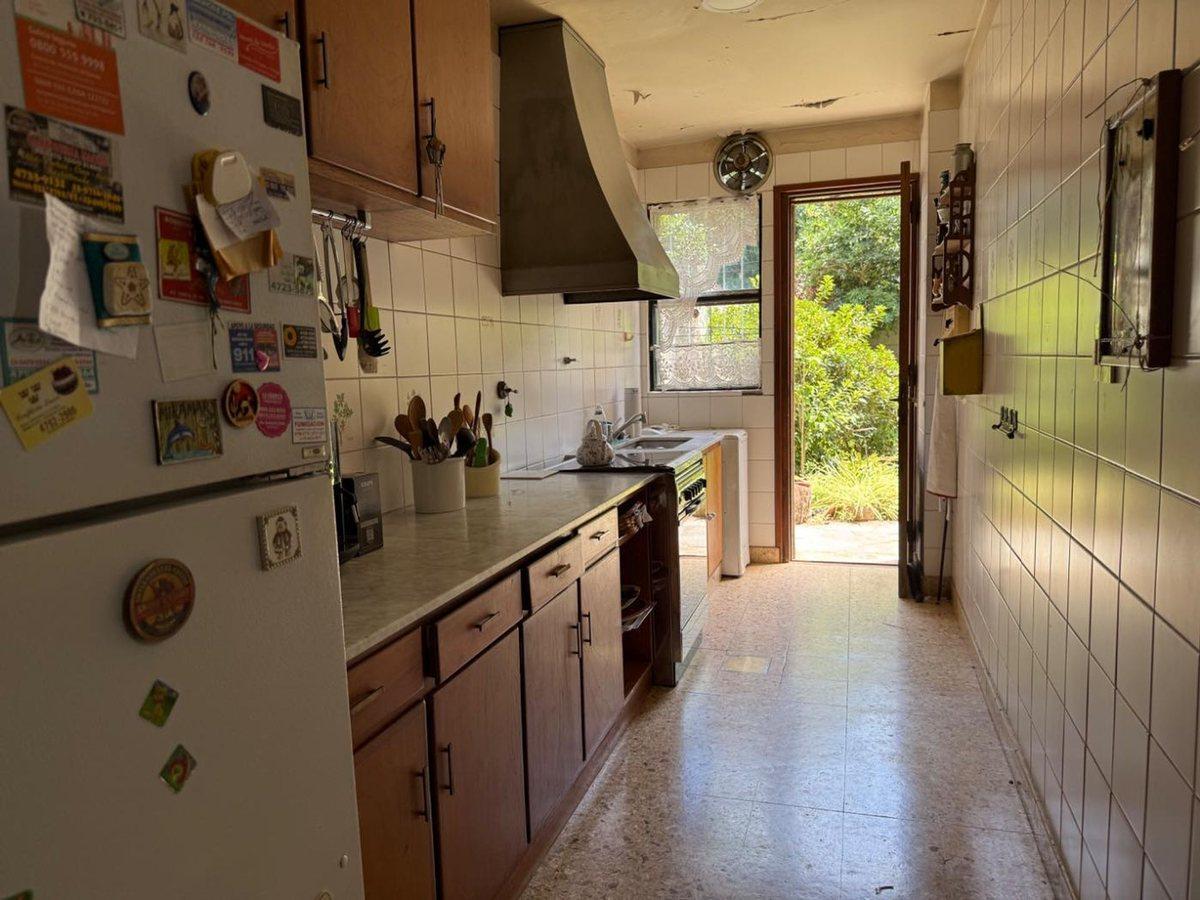 Foto de Casa de una planta con altillo y jardín Martinez, imagen 1