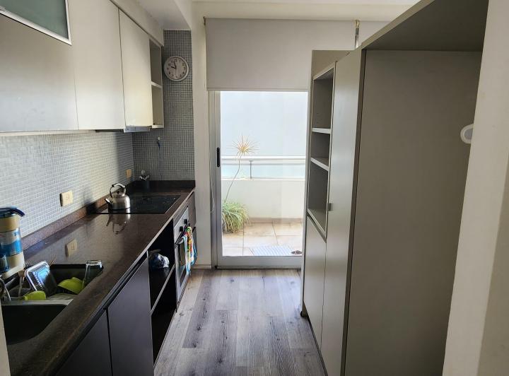 HERMOSO DEPARTAMENTO 2 AMBIENTES AL CONTRAFRENTE CON BALCON Y COCHERA  3
