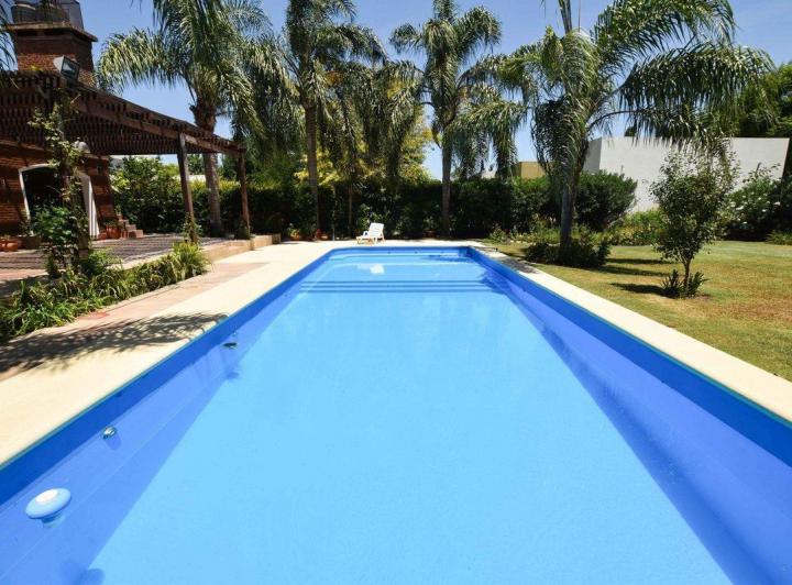 CASA CUATRO DORMITORIOS EN VENTA LA BAHIA PILETA 1
