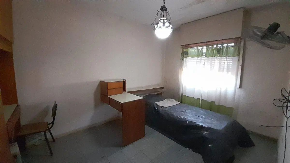 VENTA  CASA AL FRENTE  CON JARDIN EN SAN LORENZO 5