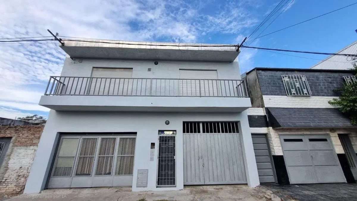 CASA EN VENTA 2 DORMITORIOS  COCHERA BARRIO MATHEU 5