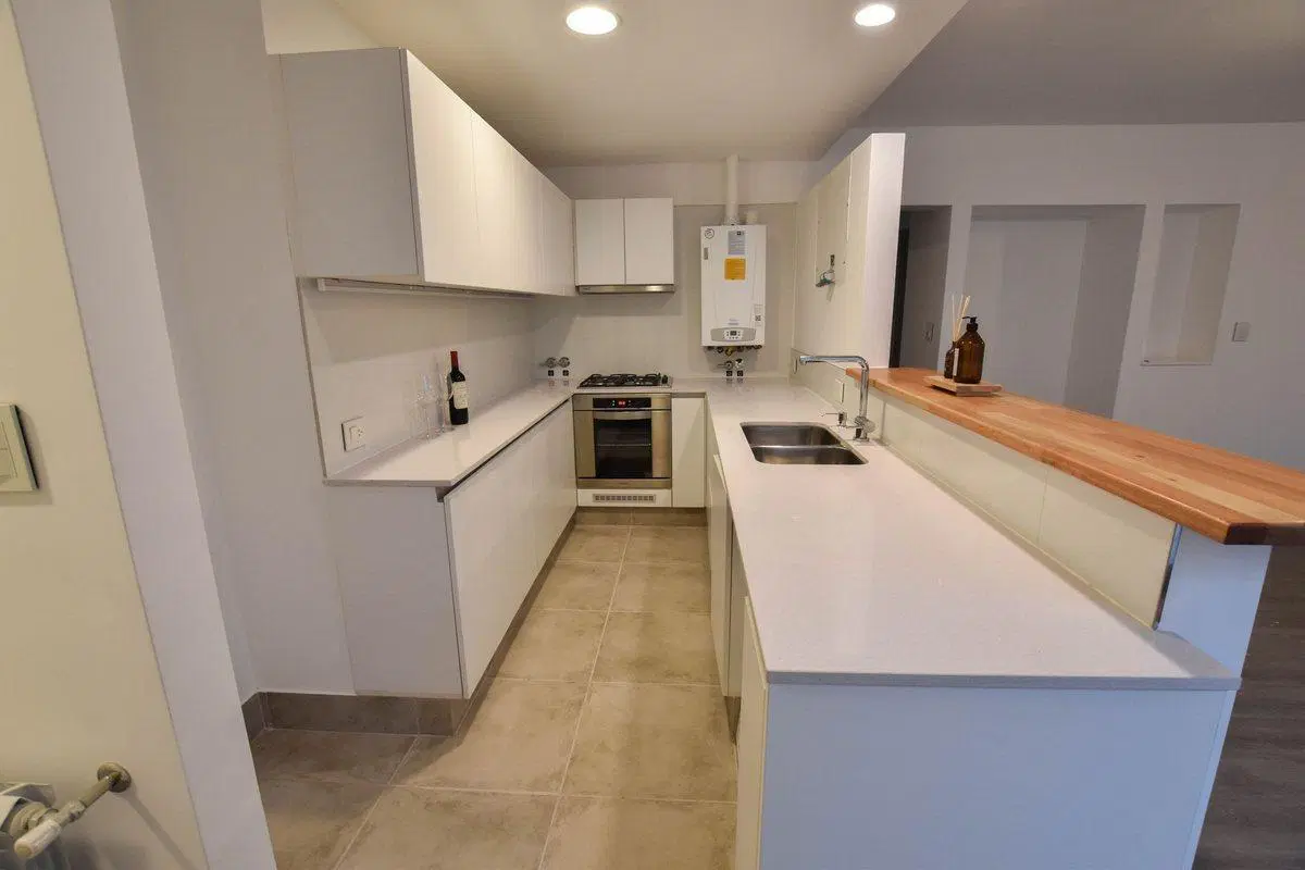 Venta departamento 2 dormitorios cochera Pichincha 4