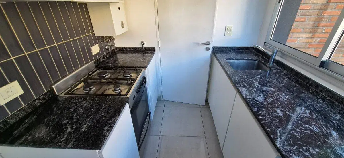 Venta departamento un dormitorios balcón  quincho 5