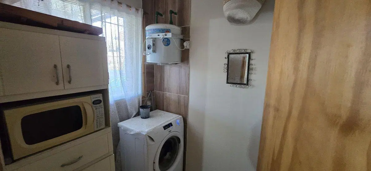 Venta casa dos dormitorios y patio verde, Alvear 5