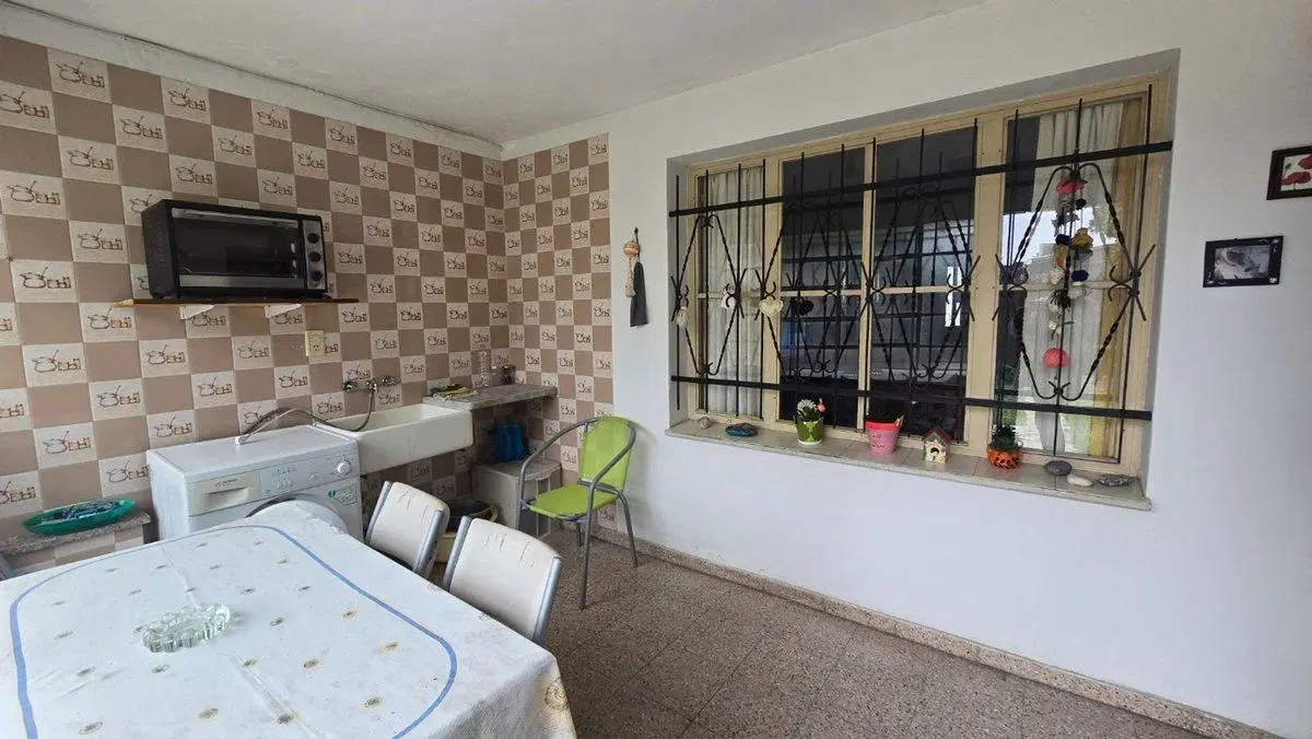 VENTA CASA 2 DORMITORIOS + COCHERA + JARDIN 5