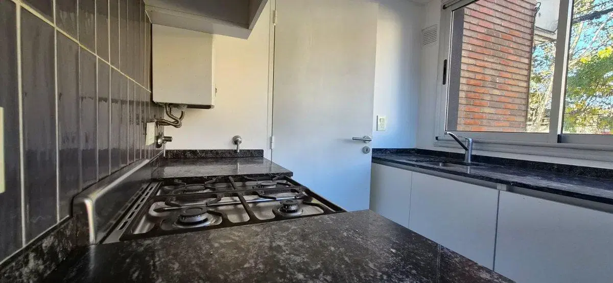 Venta departamento un dormitorios balcón  quincho 5