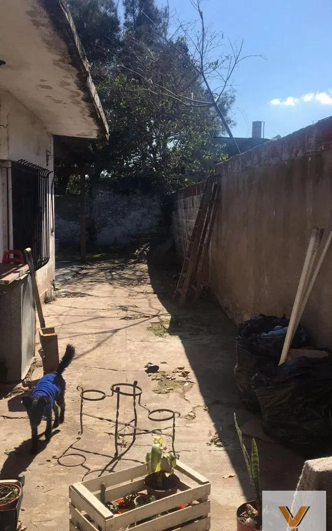 Casa en venta - 4 Dormitorios 3 Baños - 302Mts2 - Merlo 8