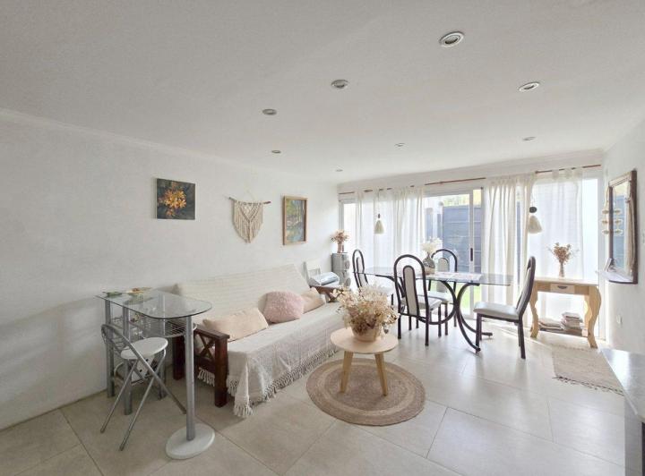 Vivienda multifamiliar con pileta y jardín 5