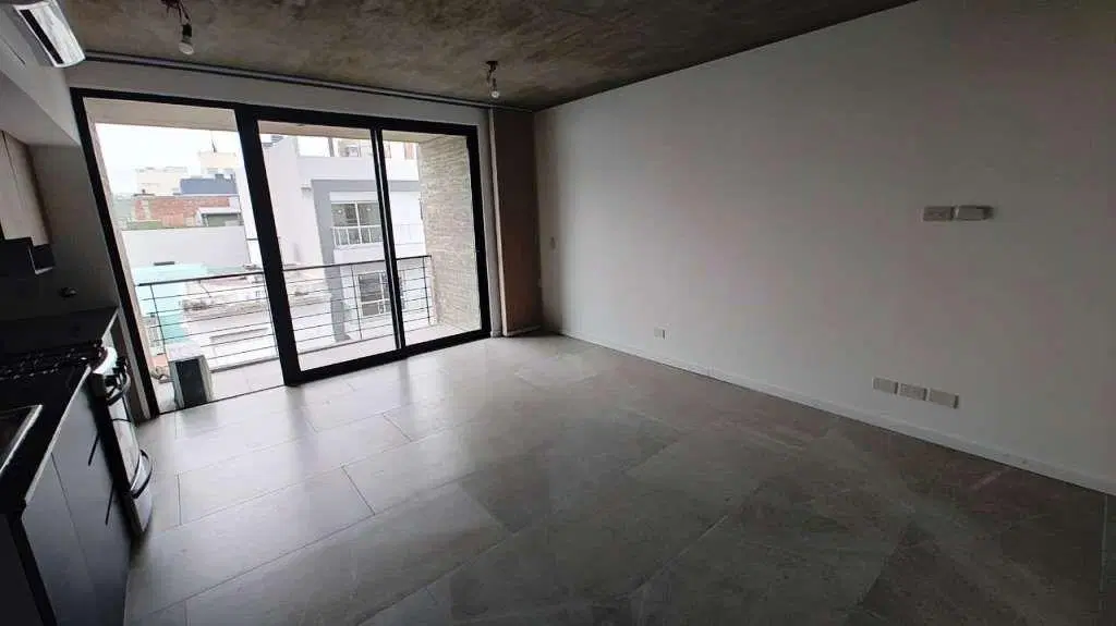 2 Ambientes a estrenar - frente - balcon.- 1