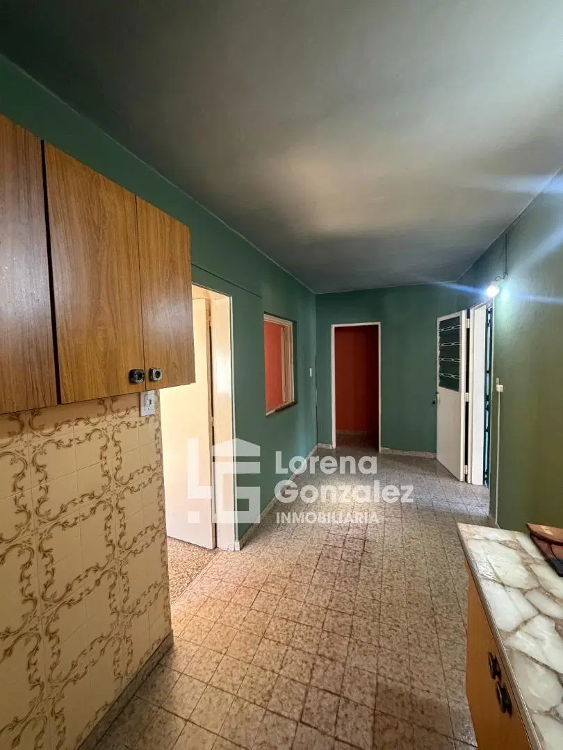 Casa con dos dormitorios + departamento 3