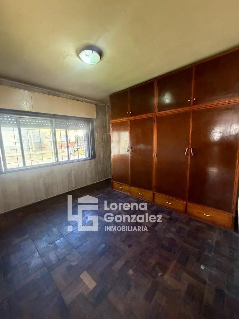 Casa con dos dormitorios + departamento 5