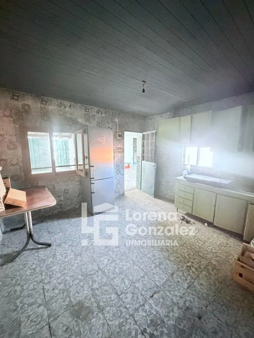 Casa con dos dormitorios + departamento 4