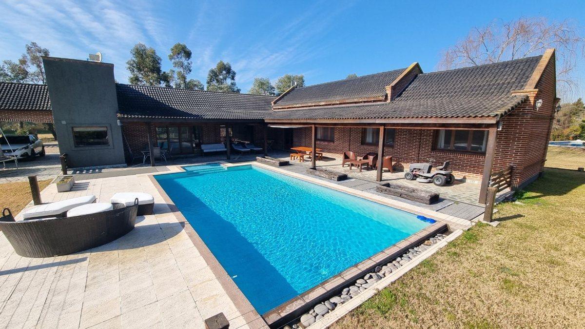 Foto de Casa en venta de 3 dormitorios -Campos de Roca I, imagen 3