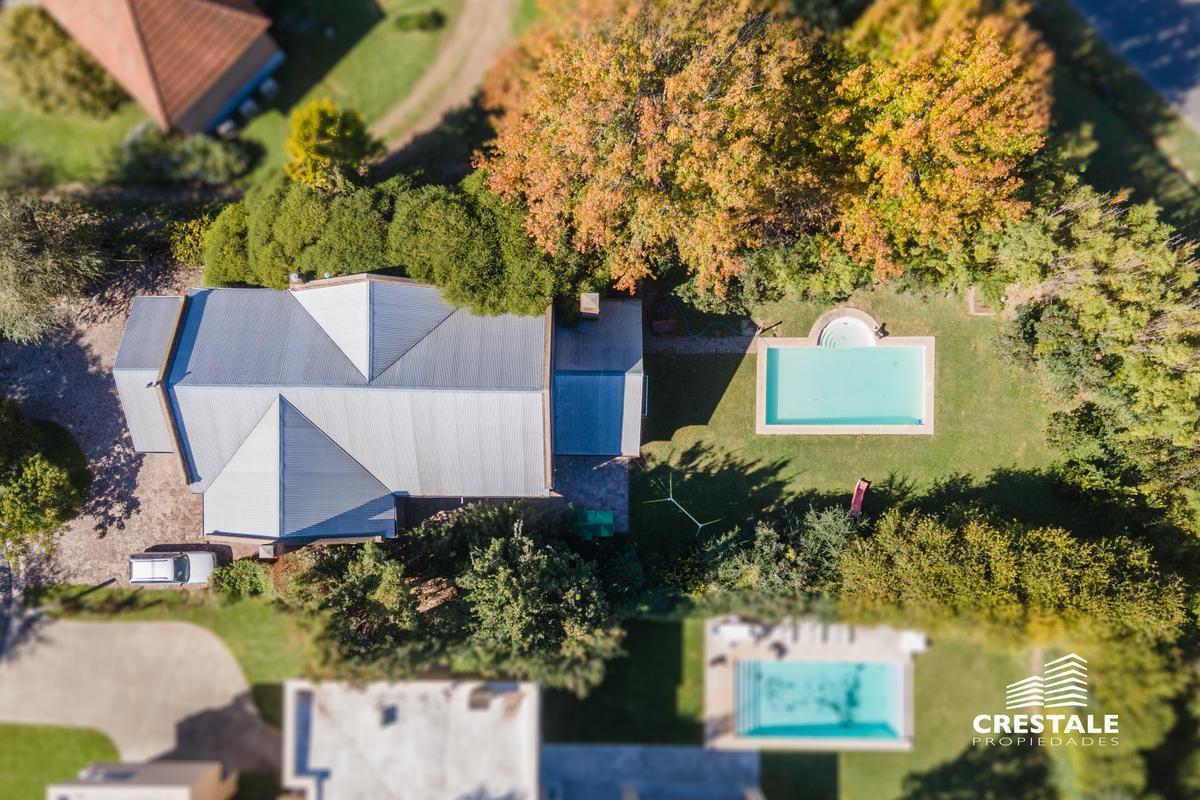 Venta / Permuta - Casa 4 dormitorios - Carlos Pellegrini, barrio privado - Fisherton, Rosario