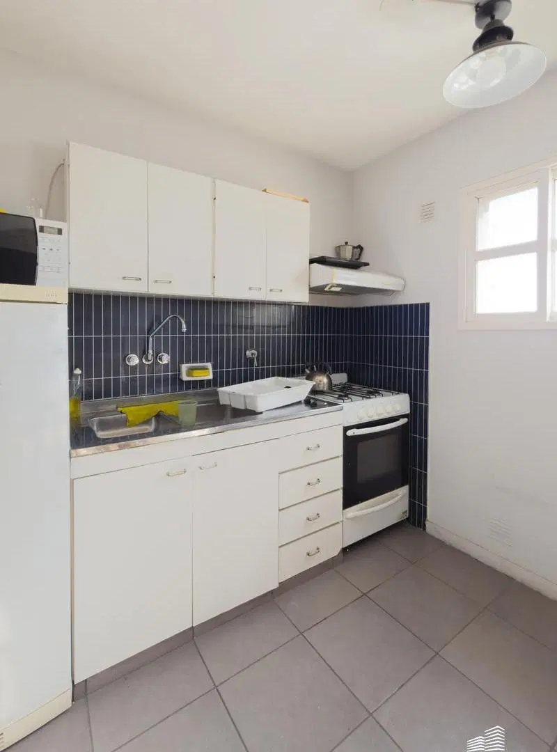 Venta / Permuta - Departamento 1 dormitorio con cochera y balcón al Norte - Martin, Rosario. 3