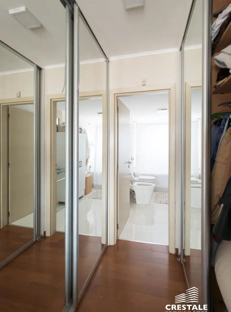 Venta / Permuta - Departamento 2 dormitorios con vista franca al río y cochera doble - Rosario. 8