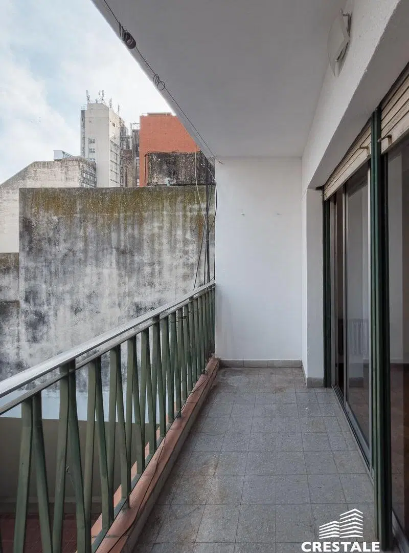 Venta / Permuta - Departamento 2 dormitorios con balcón corrido - Centro, Rosario. 8