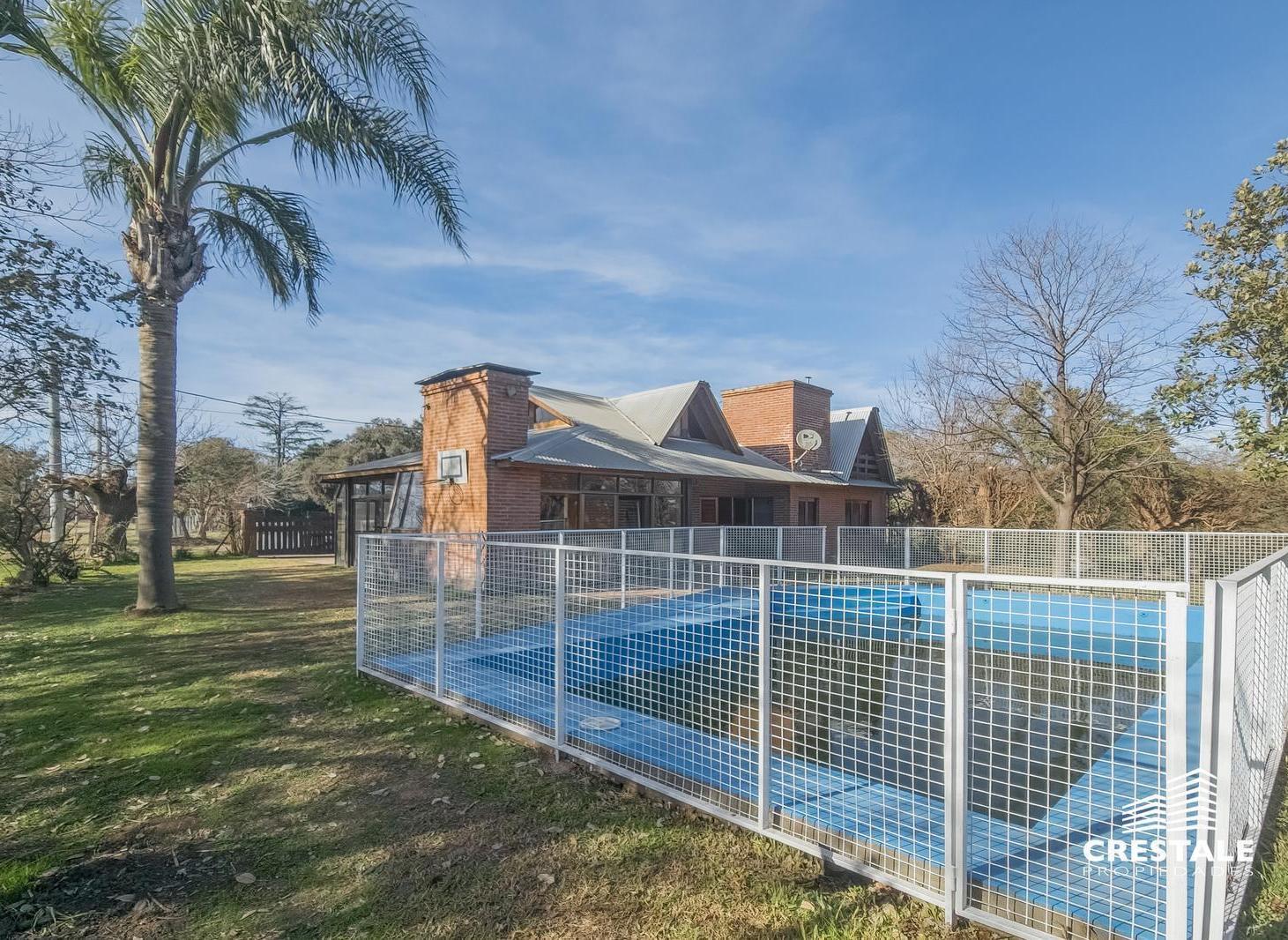 Foto de Venta / Permuta - Casa 4 dormitorios con quincho y pileta - Funes, Santa Fe., imagen 4